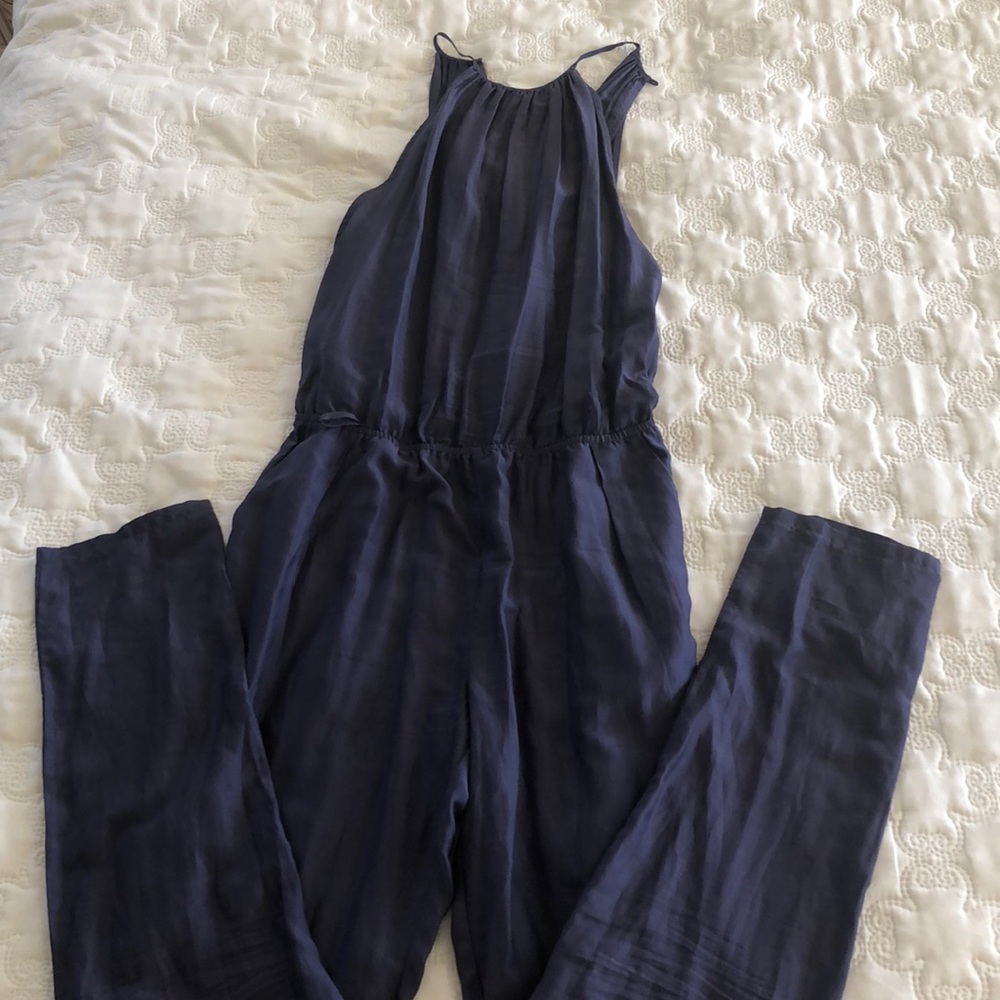 Purple skinny leg  jumpsuit size small